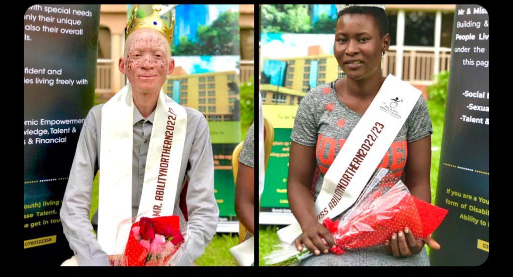 A young man with albinism wearing a long grey shirt and a sash around his neck with the words Mr Ability Northern region 2022 and a young woman with hearing impairment in a grey and organge dress with a sash over her right shoulder saying Miss Ability Northern region 2022. They are both holding red roses