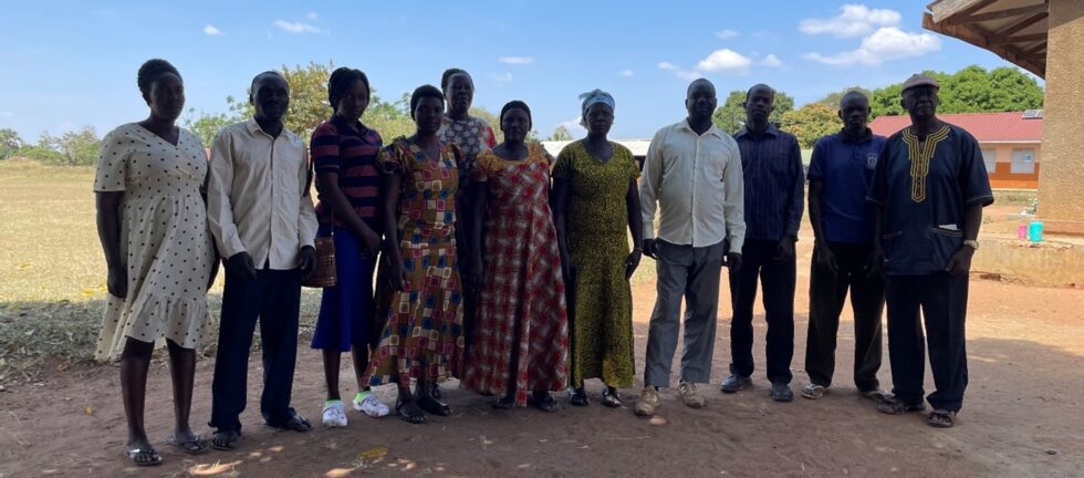 The group photo containing 11 people. They are a mix of teachers and parents of children with disabilities at Paipir Primary School